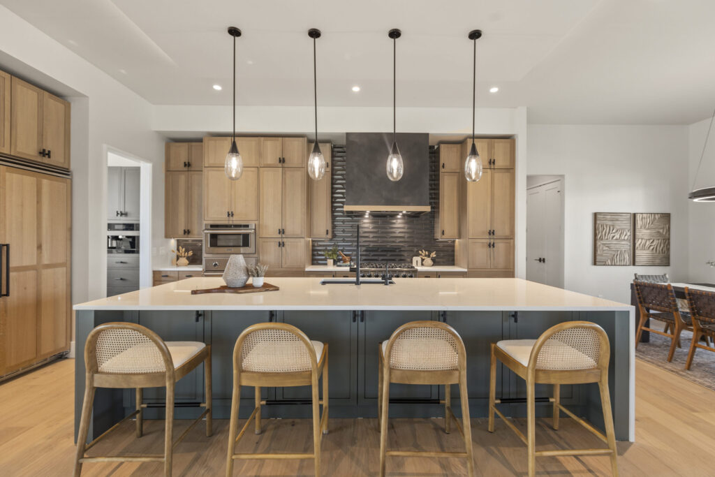 Natural oak kitchen with dark island cabinetry